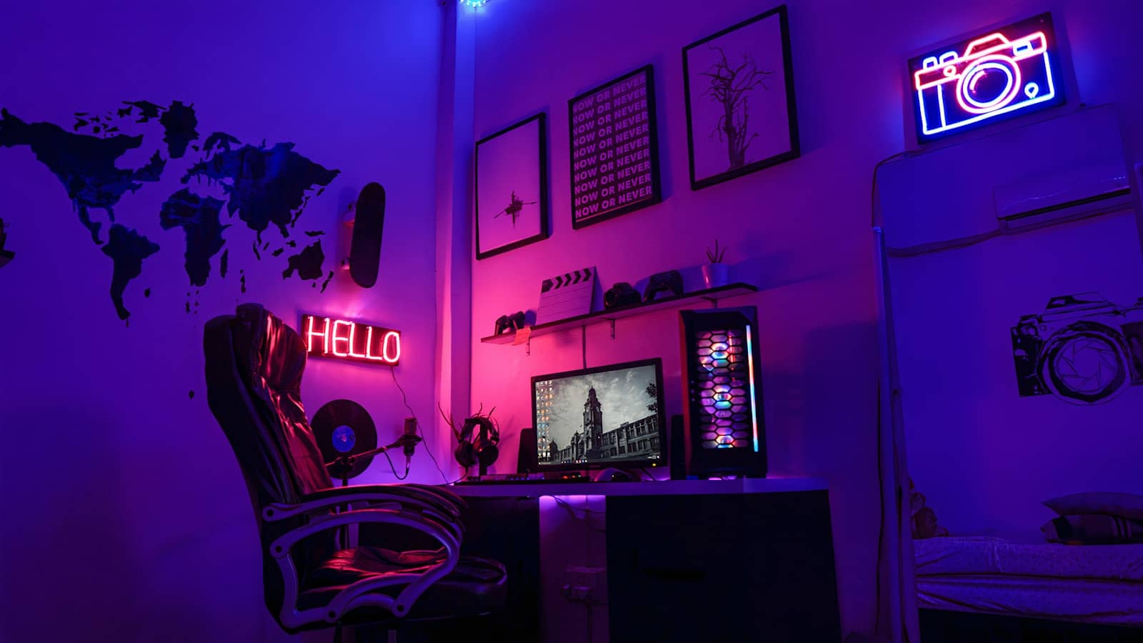 A neon-lit gaming PC setup in a dark room