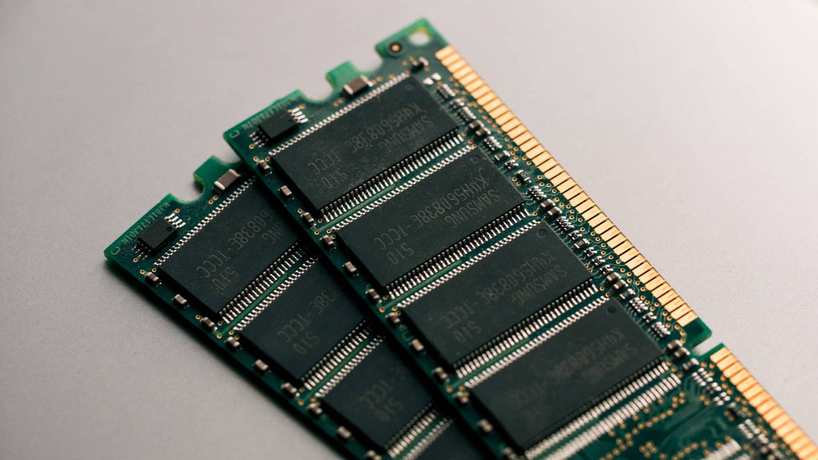 DDR memory modules on a grey surface
