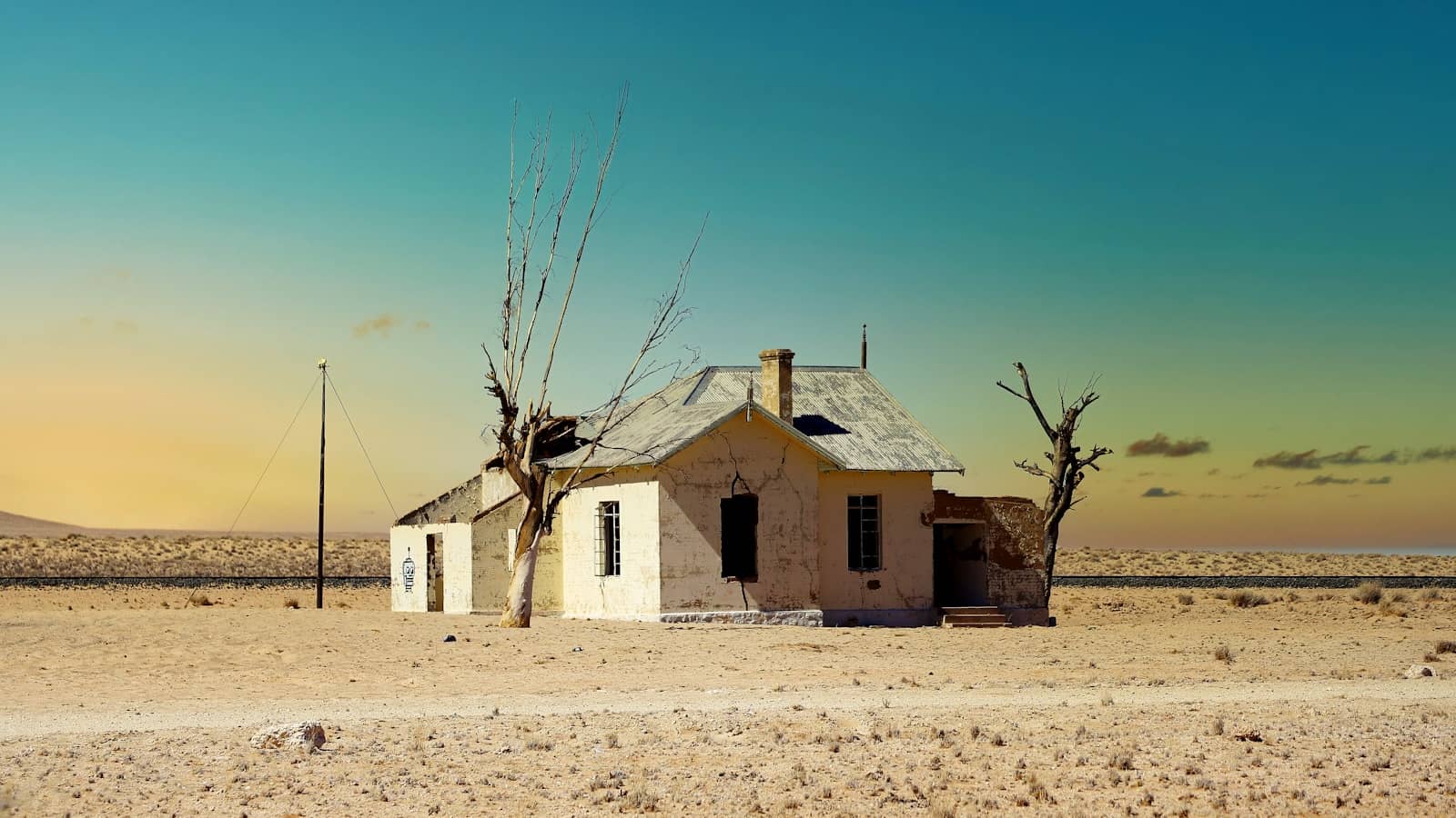 An abandoned building in a desert wasteland
