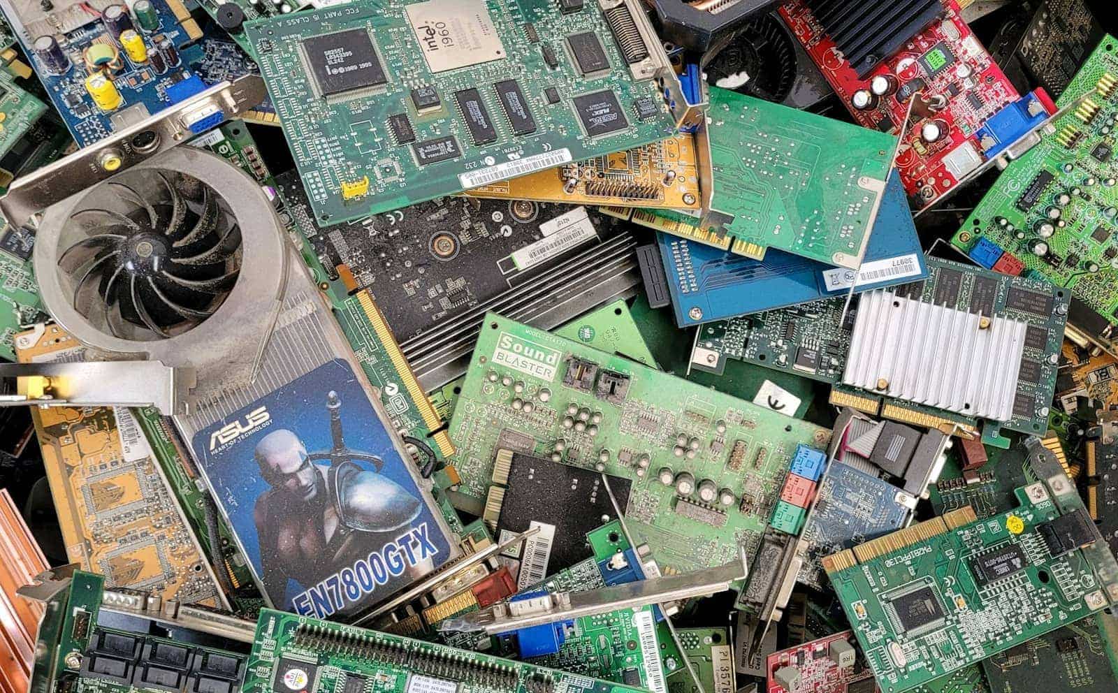A pile of used graphics cards and circuit boards
