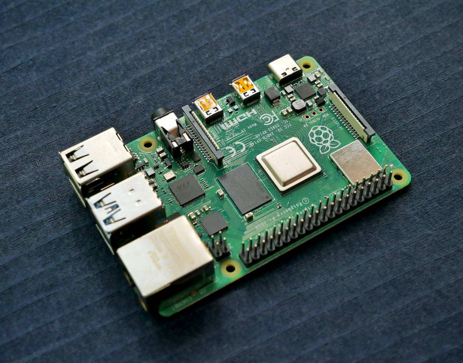 A Raspberry Pi single-board computer on a dark surface
