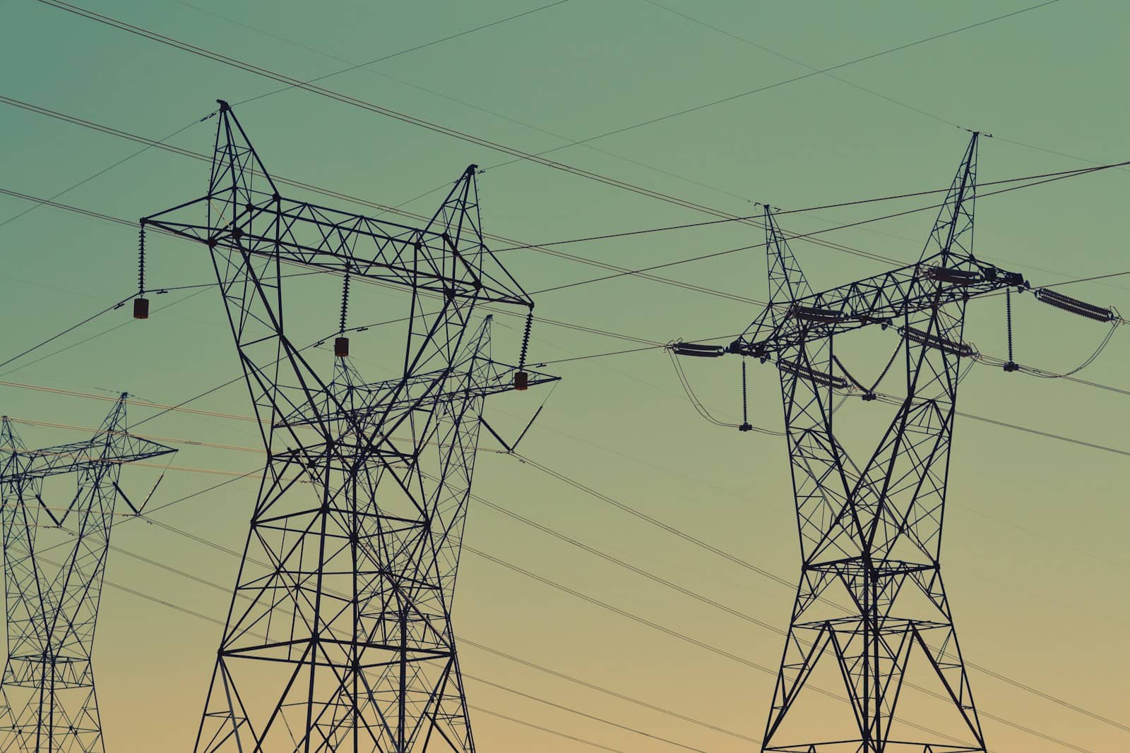 Power lines against a sky at dusk