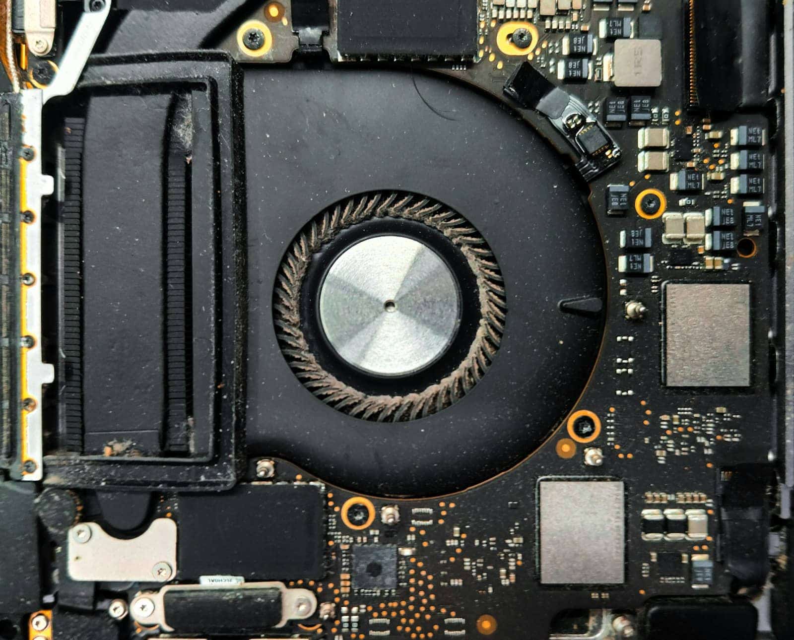 A laptop motherboard with its internal components