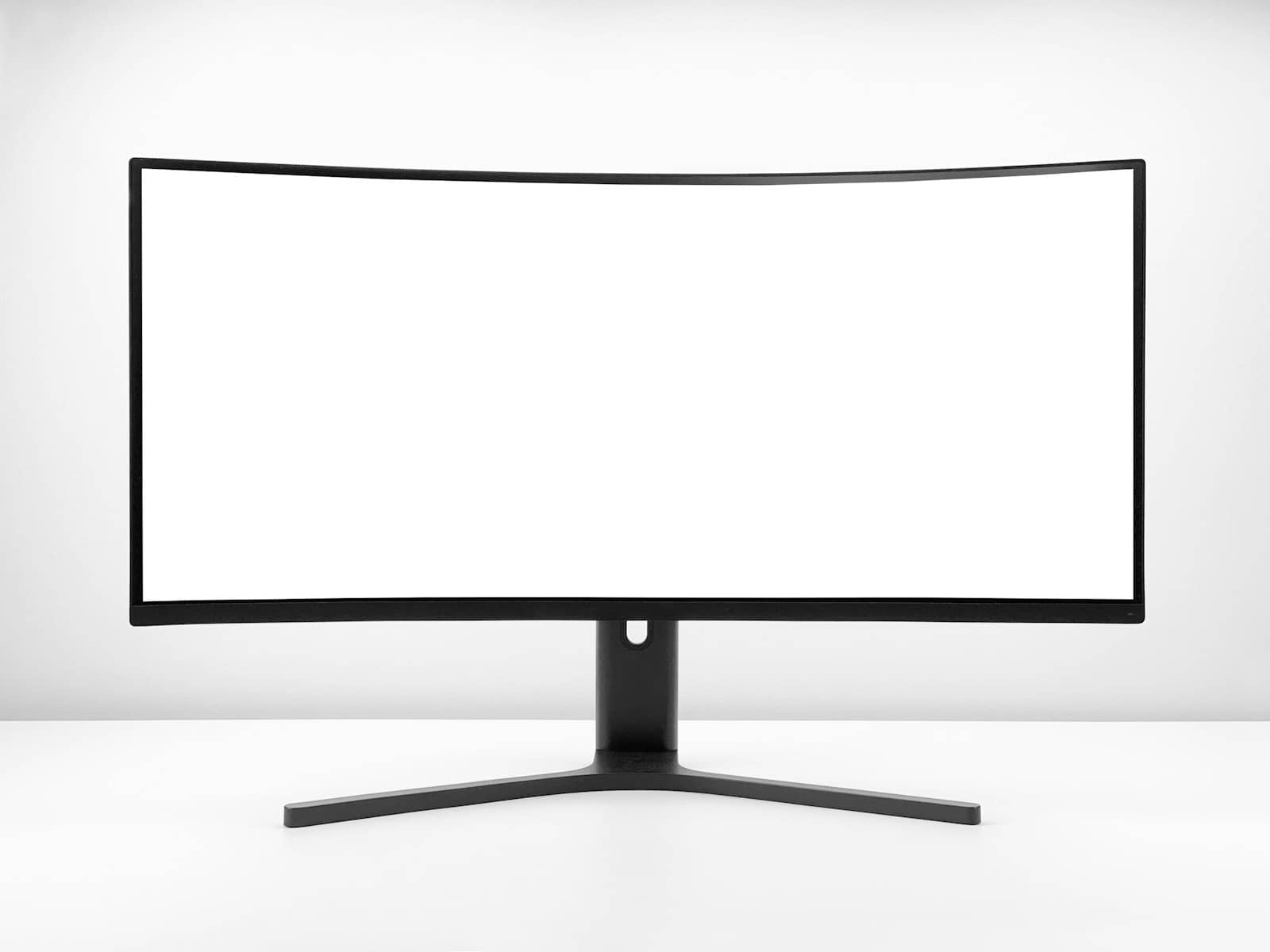 A curved gaming monitor on a light background