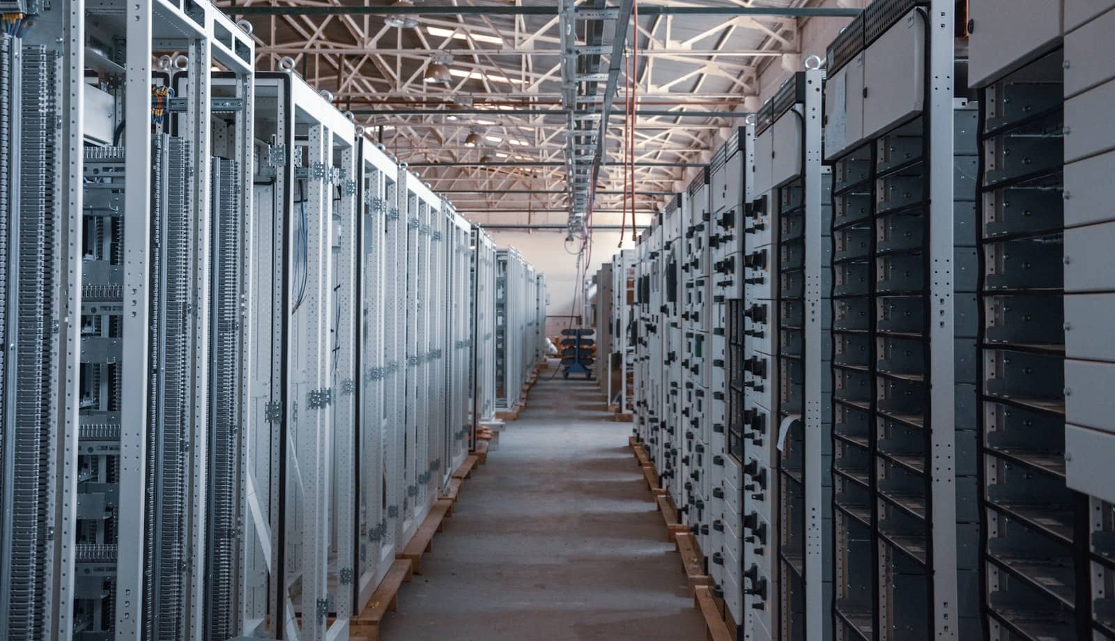 Rows of server hardware in a large hall