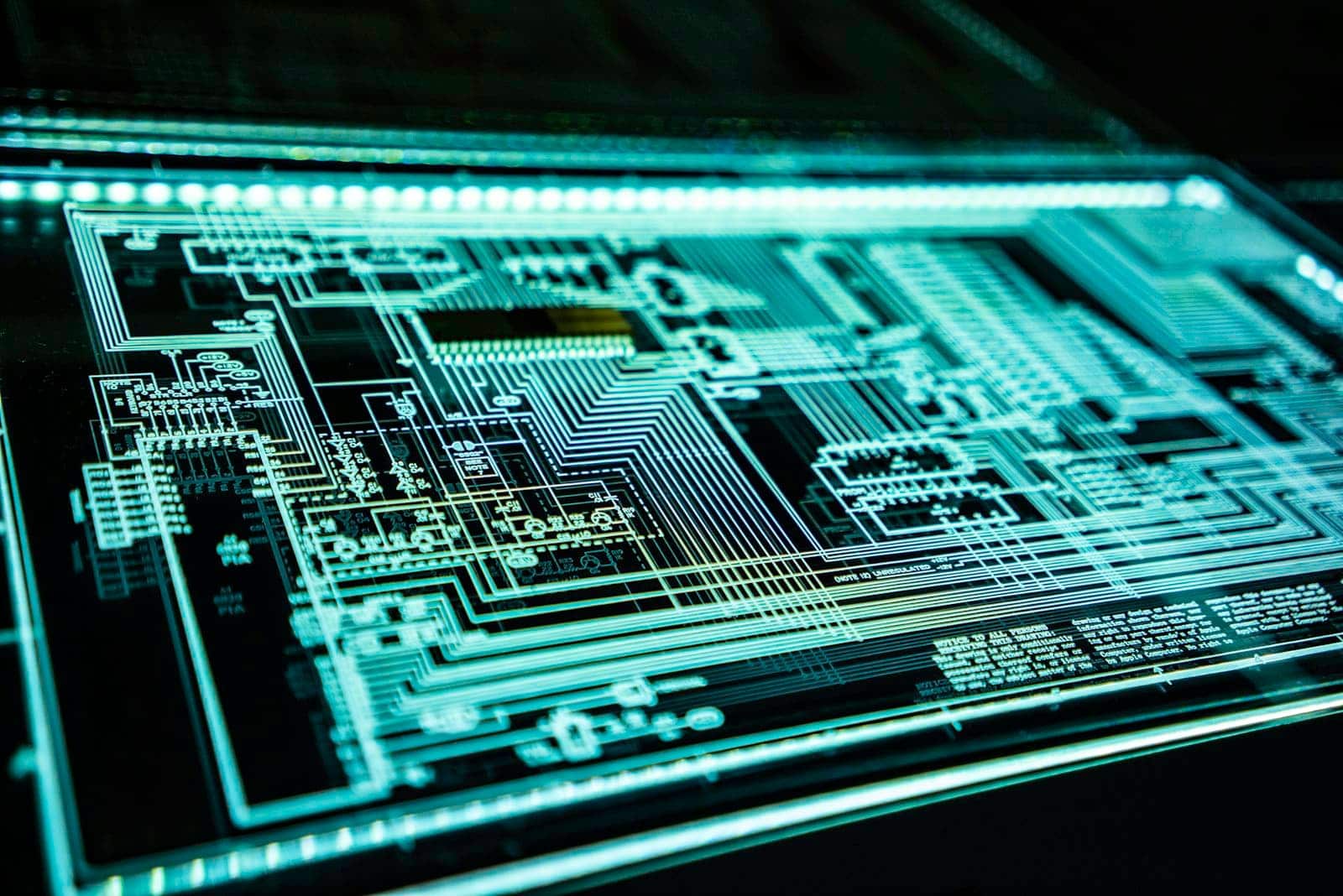 A glowing circuit-board schematic, representing data exposure