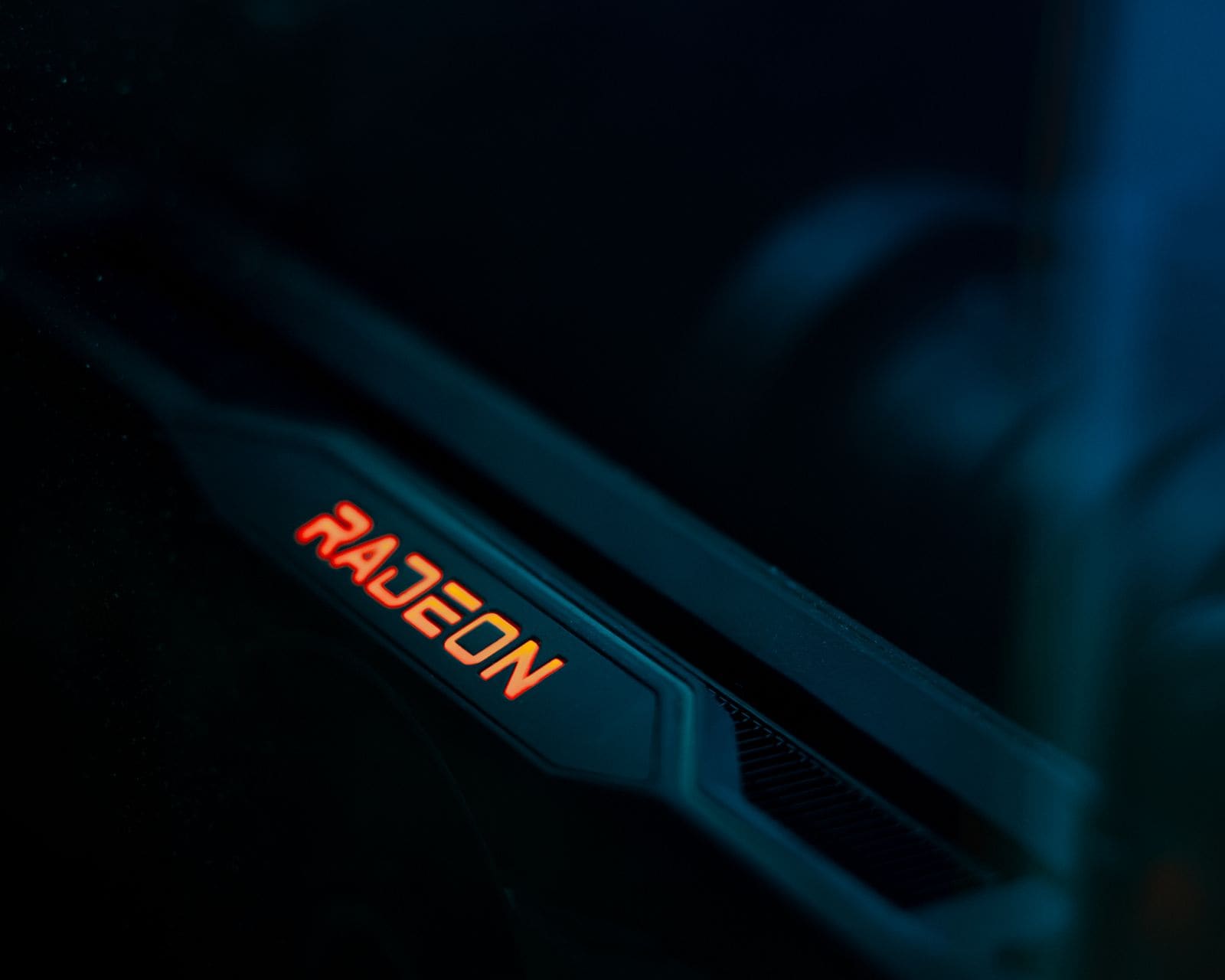 AMD Radeon graphics card logo glowing inside a dark PC build