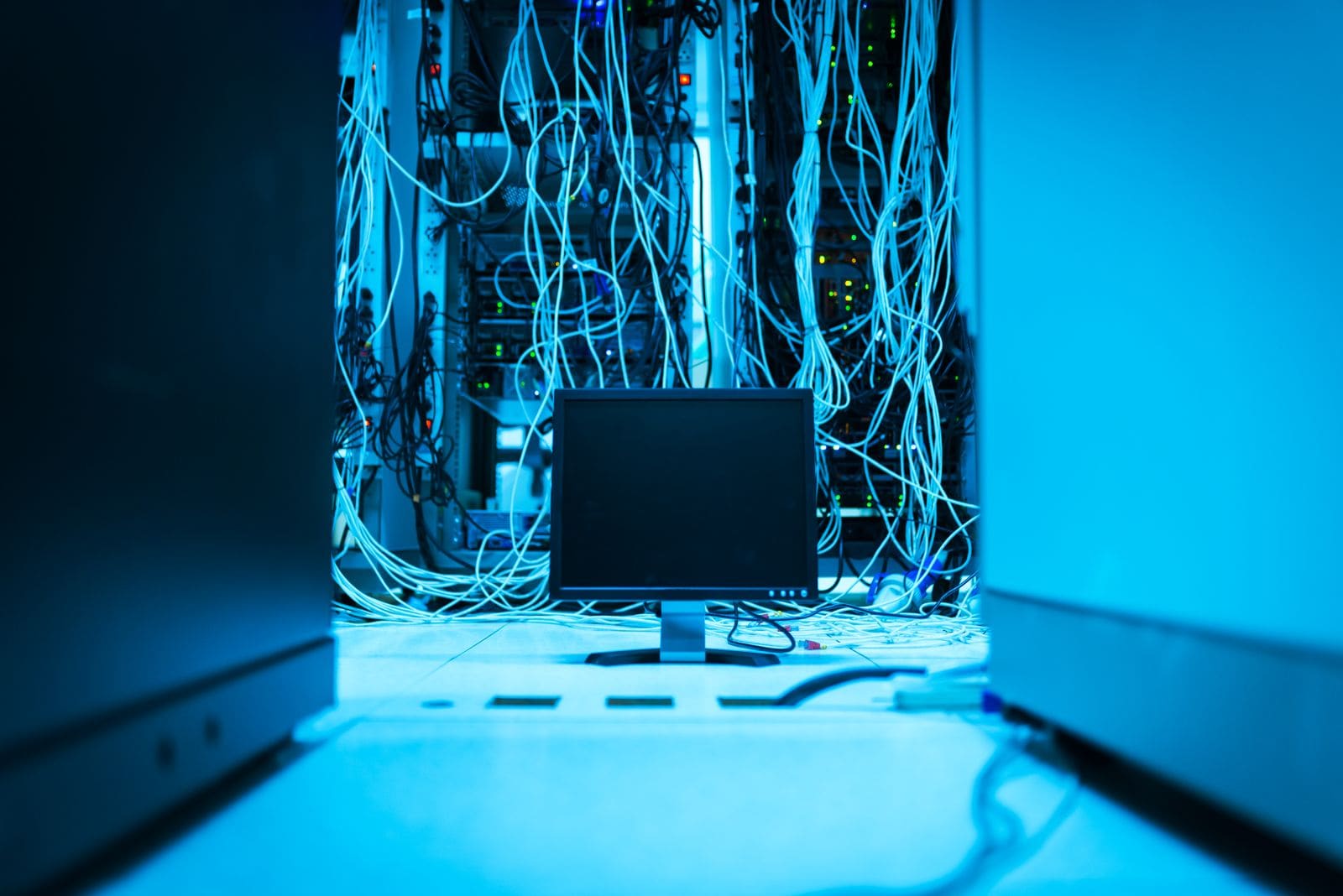 Network cabling behind server hardware in a data center