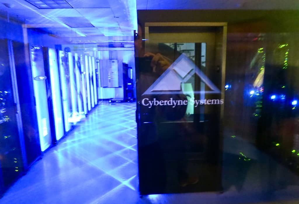 Rows of servers in a data center, representing the compute behind an AI research run