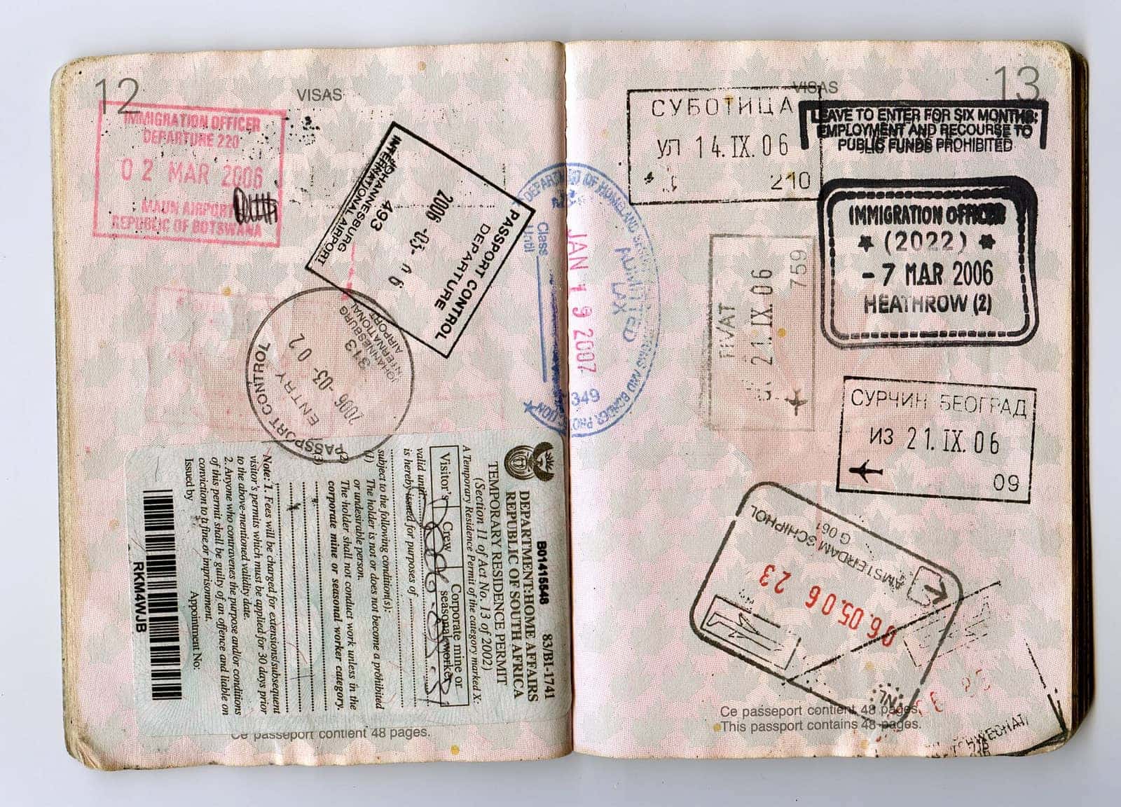 A visa stamp in a passport — H-1B holders get a 60-day grace period to find new sponsorship after a layoff