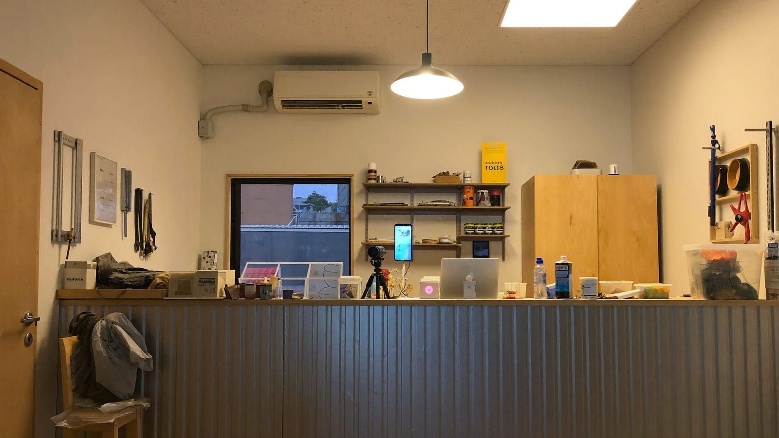 A tidy local service workshop counter with clean tools laid out in warm daylight