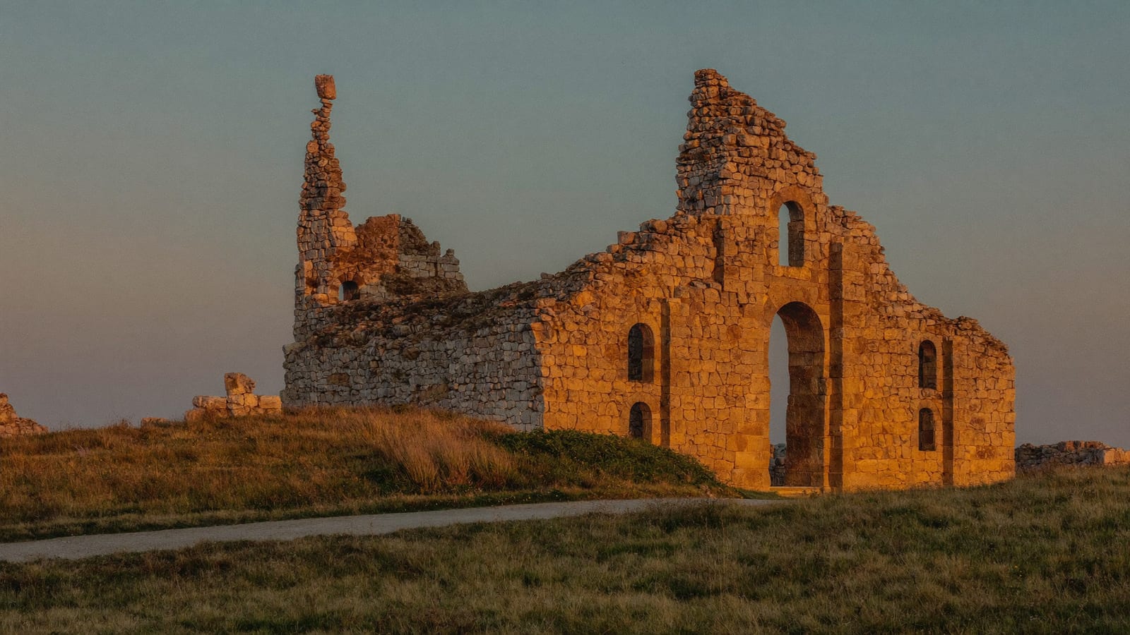 Cinematic AI b-roll of an ancient stone ruin at golden hour, atmospheric documentary style