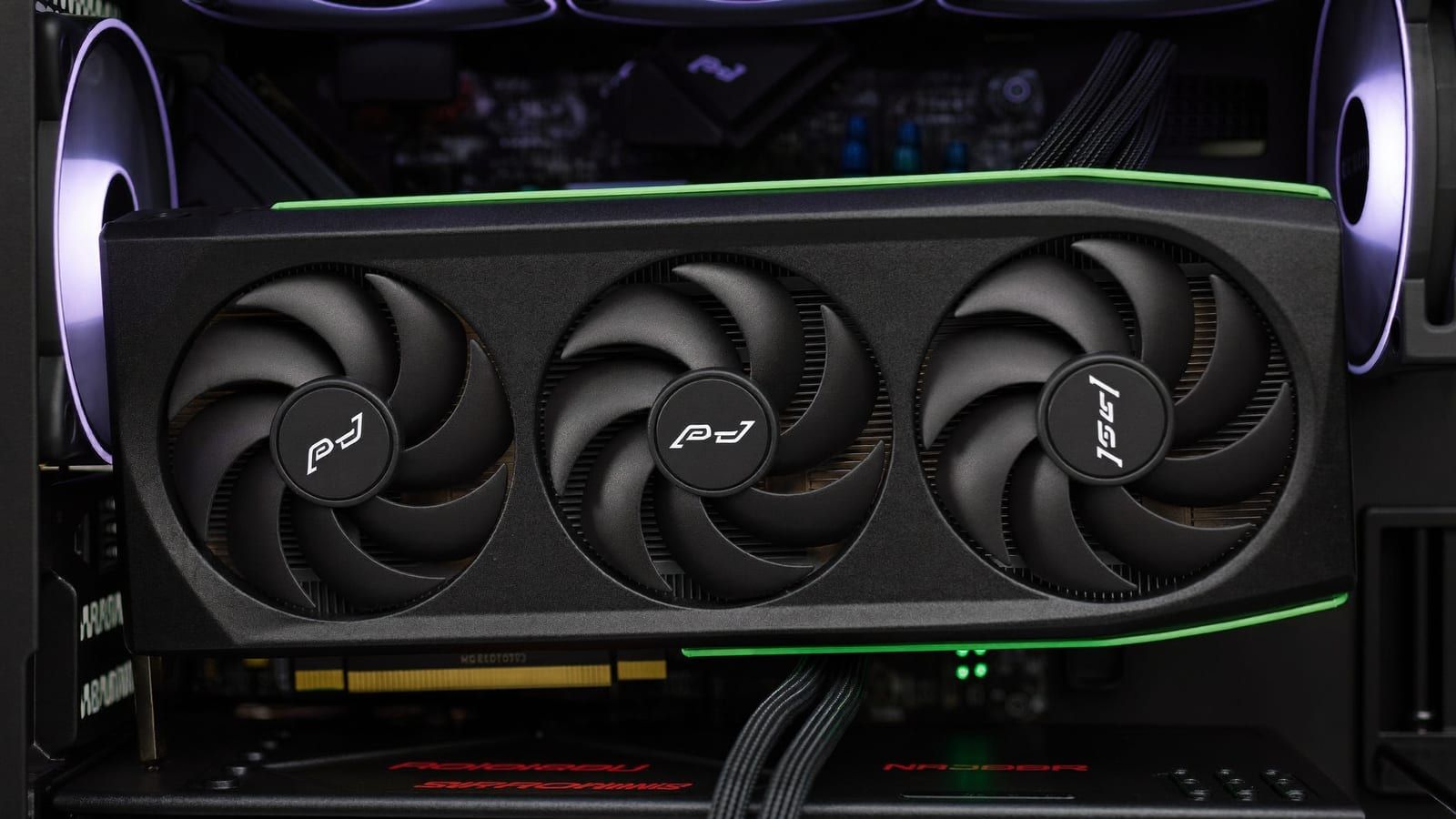 A modern graphics card glowing inside a dark PC build, for running Qwen3 locally