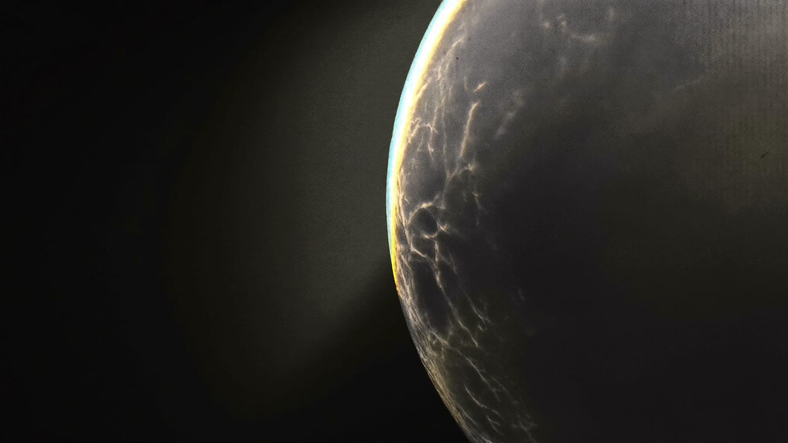 A dramatic thumbnail-style image: extreme close-up of a glowing object on a dark background with rim light and negative space