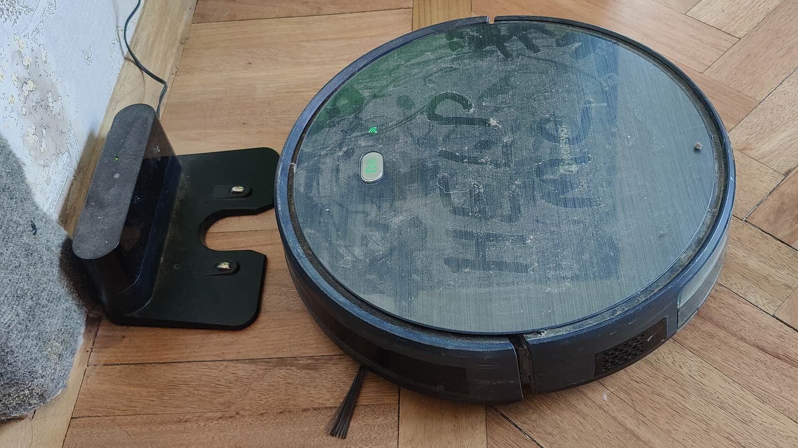 A robot vacuum cleaning a floor
